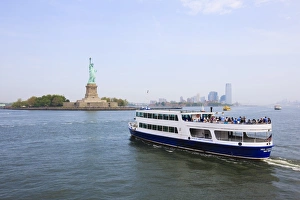 Images Dated 24th May 2009: The Statue of Liberty and ferry, Liberty Island, New York City, New York
