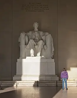 Tribute Prints: The statue of Lincoln in the Lincoln Memorial being admired by a young girl