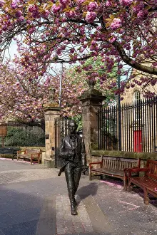 Sidewalk Prints: Statue of poet Robert Fergusson by David Annand outside Canongate Kirk