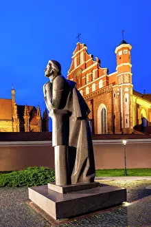 Adam Prints: A Statue of the Polish Poet Adam Mickiewicz in front of St