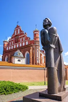 Adam Prints: A Statue of the Polish Poet Adam Mickiewicz in front of St