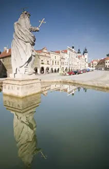 Statue of saint and fountain, Renaissance buildings at Zachariase z Hradce Square