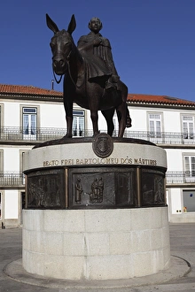 Minho Prints: Statue of St. Bartholemew on a donkey in Viana do Castelo, Minho, Portugal, Europe