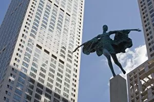 Images Dated 31st August 2008: Statue of a woman among high office buildings in Guomao Central Business District, Beijing, China