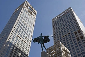 Images Dated 31st August 2008: Statue of a woman among high office buildings in Guomao Central Business District, Beijing, China