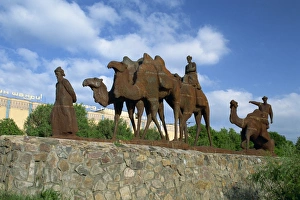 Uzbekistan Prints: Statues of camels and camel drivers on Silk Road monument