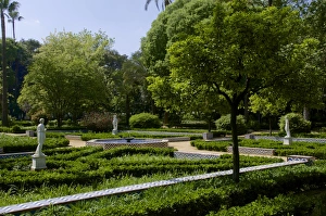 Maria Luisa Park Prints: Statues and flower beds, Maria Luisa park, Seville, Andalusia, Spain, Europe