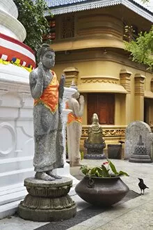 Statues at Gangaramaya temple, Cinnamon Gardens, Colombo, Sri Lanka, Asia