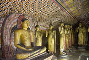 Caves Prints: Statues and painted roof in natural cave in granite, Cave No 2, Maharaja Viharaya