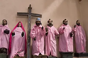 Santiago Atitlan Prints: Statues of saints dressed in indigenous attire in the Catholic Church, dating from 1571