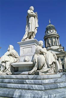 Statues on the Schiller monument in the Gendarmenmarkt in Berlin