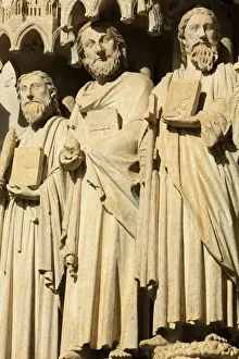 Saints Prints: Statues in the splay and the left sidewall of the central portal depicting from right to