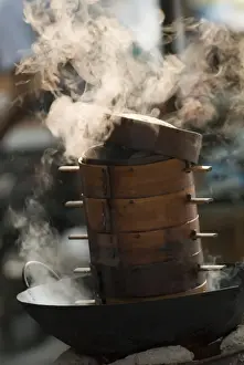 Readying Prints: Steaming baskets on wok, Leshan, Sichuan, China, Asia