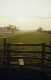December Prints: Stile and marker arrow on footpath along the River Severn, in December