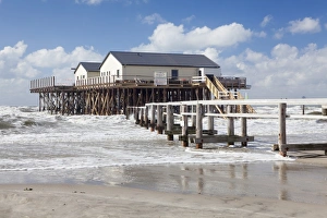 Stilt Houses Prints: Stilt houses in the stormy sea