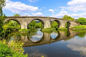 Stirling Prints: Stirling Bridge over River Forth with reflections and green surroundings in Scotland