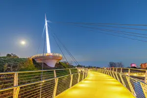 Recreational Prints: Stockingfield Bridge connects pathways over Forth and Clyde Canal during evening hours in Glasgow