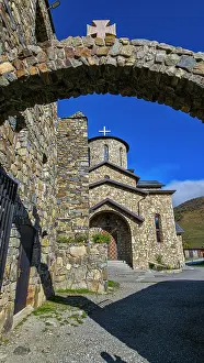 Pilgrimage Prints: Stone architecture of Alanskiy Svyato-Uspenskiy Mu zhskoy Monastry in North Ossetia with clear sky in background