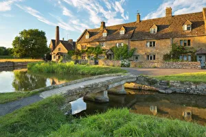 Townscape Prints: Stone bridge and cotswold cottages on River Eye