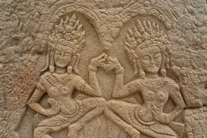 Sculptures Prints: Stone carvings of dancers at Bayon Temple show intricate details created by ancient artisans in Cambodia