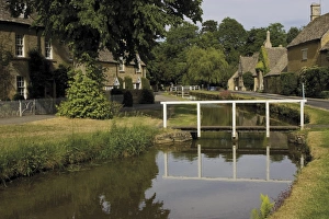 Stone cottages along the banks of the River Eye, Lower Slaughter, The Cotswolds