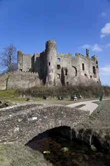 Images Dated 10th March 2010: Stone footbridge in front of Laugharne Castle, Carmarthenshire, Wales, United Kingdom