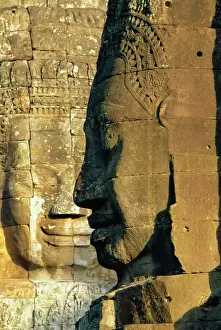 Cambodia Prints: Stone heads typifying Cambodia on the Bayon Temple at Angkor Wat, Siem Reap