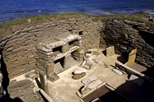 Furniture Prints: One of eight stone houses with stone furniture including beds