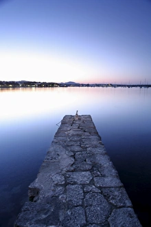 Stone jetty at dusk
