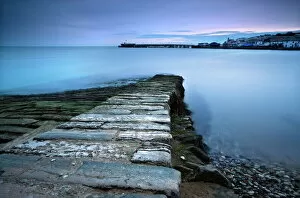 Jetty Gallery: Stone jetty and new pier at dawn, Swanage, Dorset, England, United Kingdom, Europe