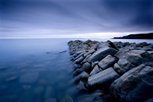 Stone jetty at twilight, Kimmeridge Bay, Purbeck District, Dorset, England Stone jetty at twilight, Kimmeridge Bay, Purbeck District, Dorset, England