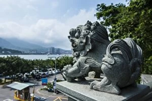 Images Dated 12th April 2011: Stone lion overseeing the Danshui river from the Guandu Temple, Guandu, Taipei, Taiwan, Asia