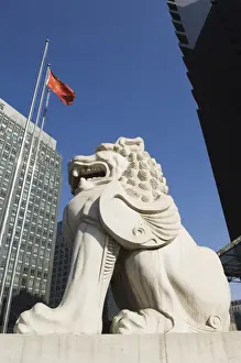 Flag Prints: A stone lion statue in the Central Business District business district