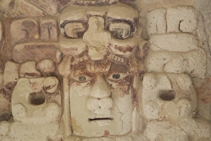 Glass Prints: Stone mask of Mayan Sun God Kinichna, taken through protective glass, Becan, Mayan Ruins