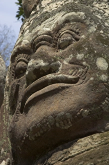 Regent Prints: Stone statuary of human face, Ta Prohm temple, Angkor, UNESCO World Heritage Site