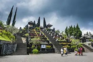 Besakih Prints: Stone statues with colourful capes in the Pura Besakih temple complex