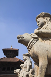 Bhaktapur Prints: Stone statues guard Durga temple