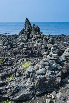 Stack Prints: Stone walls made by tourists on the island of Jejudo