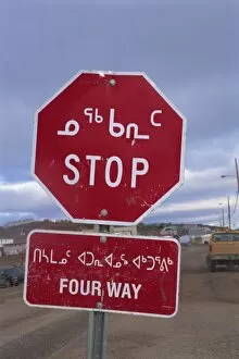 Stop sign in Iniktituk language, Iqaluit, Baffin Island, Canadian Arctic