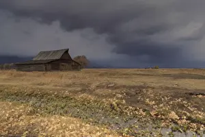 Barn Prints: Storm approaches, autumn (fall) leaves and drainage ditch with Mormon Row barn