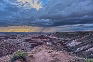 Storm Prints: Storm approaches over the canyons at Petrified Forest National Park in Arizona viewed from Nizhoni Point
