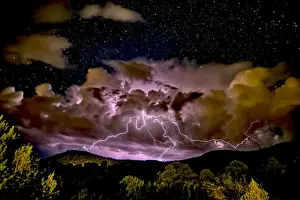Nighttime Prints: A storm approaching Sullivan Butte in Chino Valley at night with a starry sky above