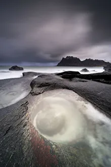 Nordland Gallery: Storm clouds over The Eye rock formation washed by waves, Uttakleiv, Leknes, Vestvagoy, Nordland
