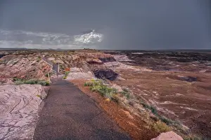 Storm Prints: Storm clouds gather over Blue Mesa in Petrified Forest National Park Arizona just before a rainstorm