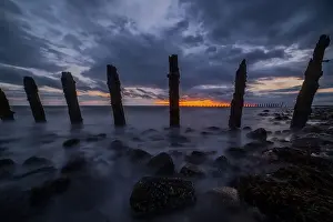 Wood Material Prints: Storm clouds gather over the Irish Sea