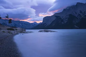 Storm over Mount Inglismaldie and Lake Minnewanka at sunrise, Banff National Park