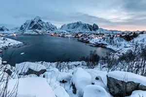Hamnoy Prints: Stormy clouds over the Bay of Hamnoy famous for its dried codfish and for typical houses