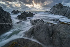Stormy sunset over the dramatic North Devon coast, Devon, England, United Kingdom, Europe