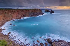 Sea Stacks Prints: Stormy sunset sky with milky tide and surf taken on a slow shutter speed