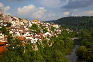 Veliko Tarnovo Prints: Stormy weather at dusk over hillside houses above the Yantra River, Veliko Tarnovo